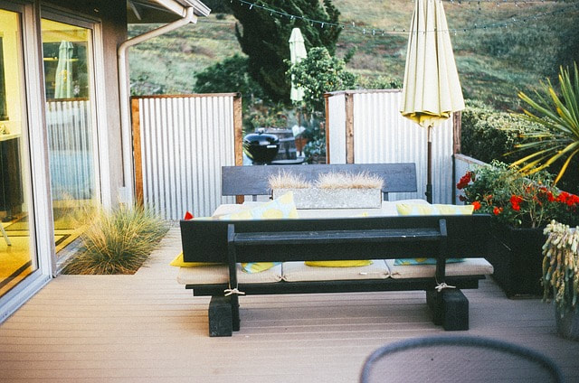 Backyard patio with dark oak bench
