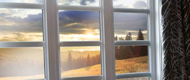 image of window with a sunset view shining through it